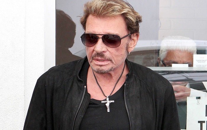 La croix guitare de Johnny Hallyday : Symbole de force et de passion