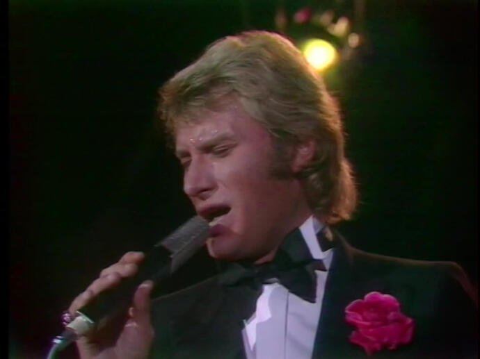 Paroles de Johnny Hallyday : "Que je t'aime"